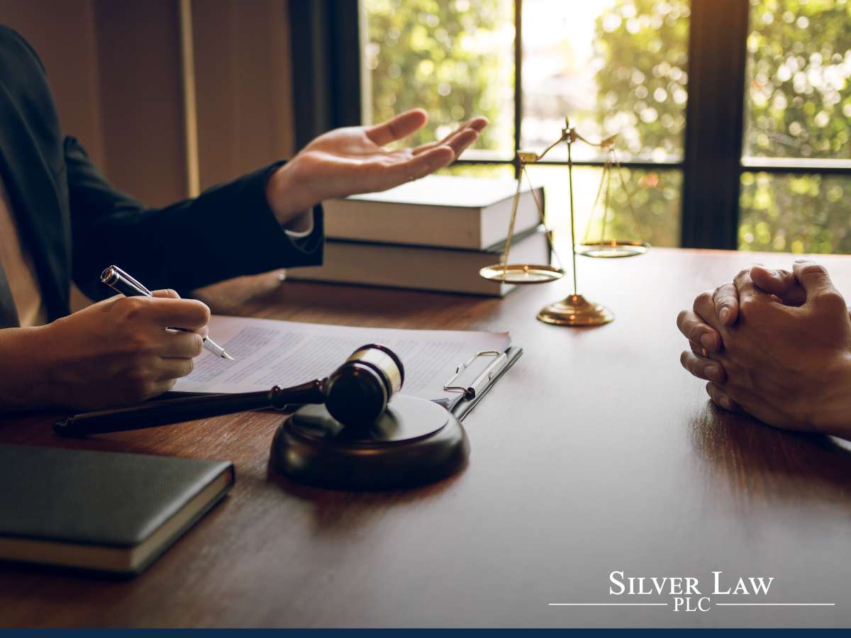 Attorney discussing The Qualified Small Business Stock Exclusion with a client